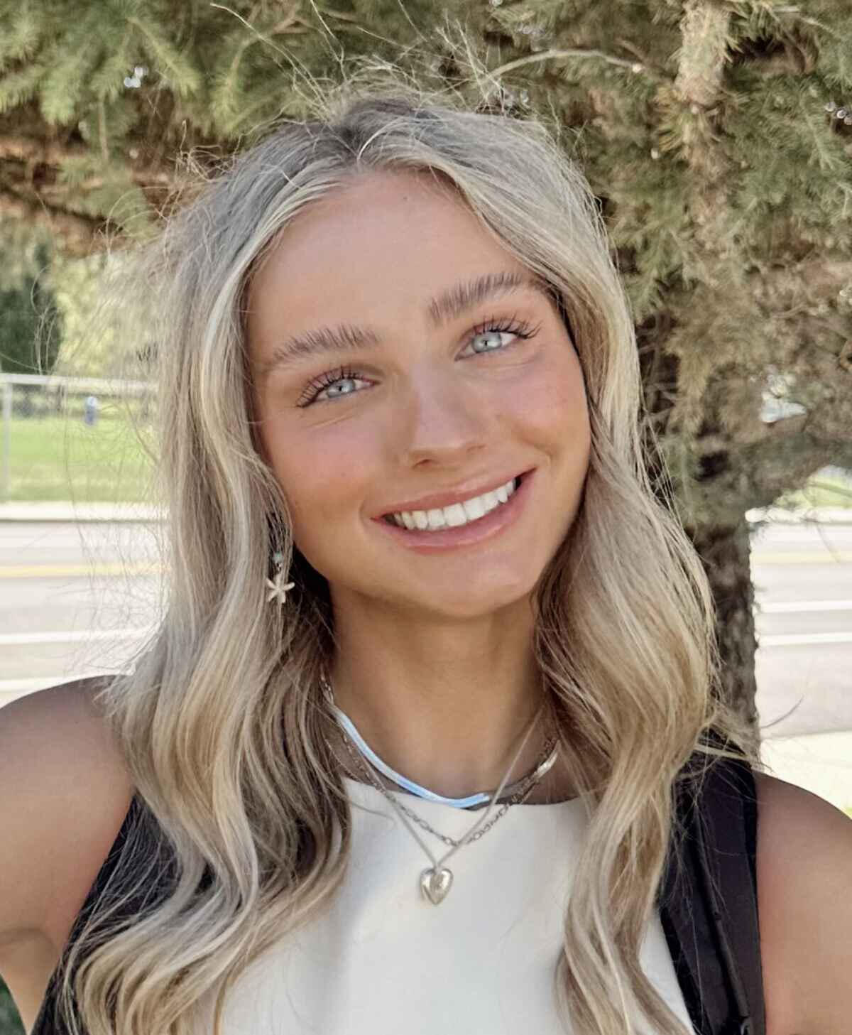 Person developing a website on a laptop