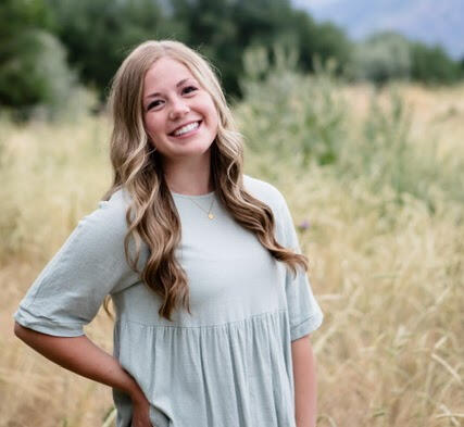 Person developing a website on a laptop