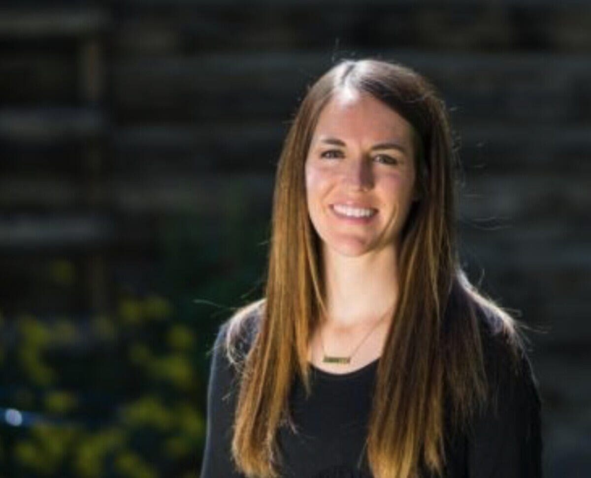 Person developing a website on a laptop