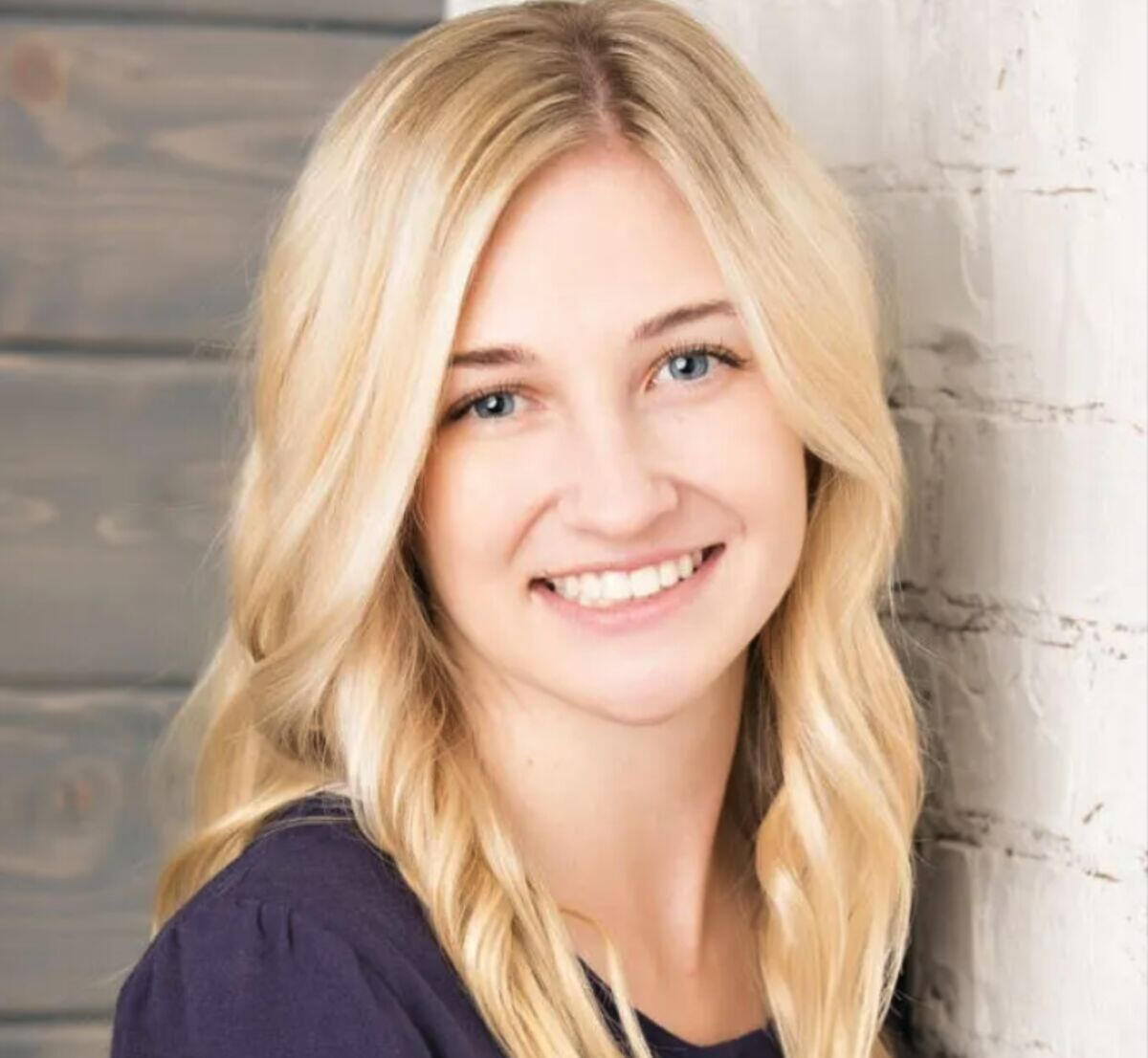 Person developing a website on a laptop